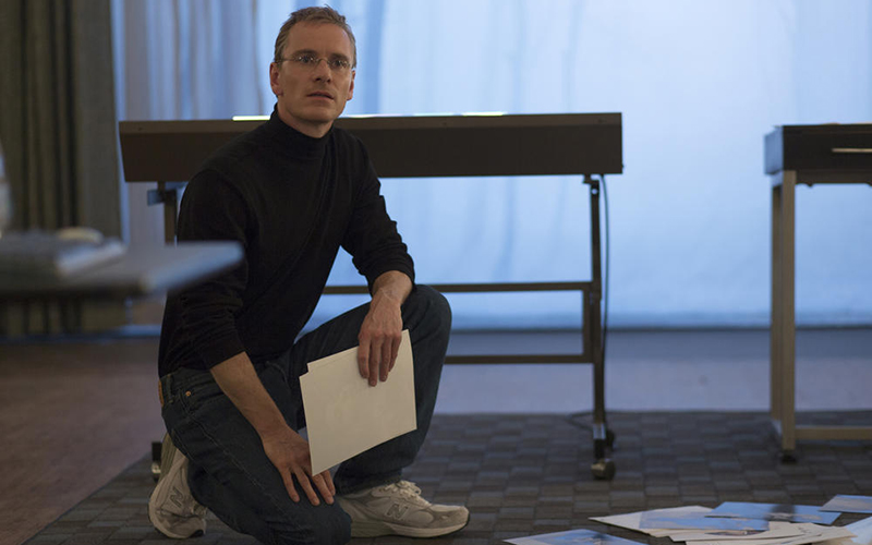 A person sitting on a table

Description automatically generated